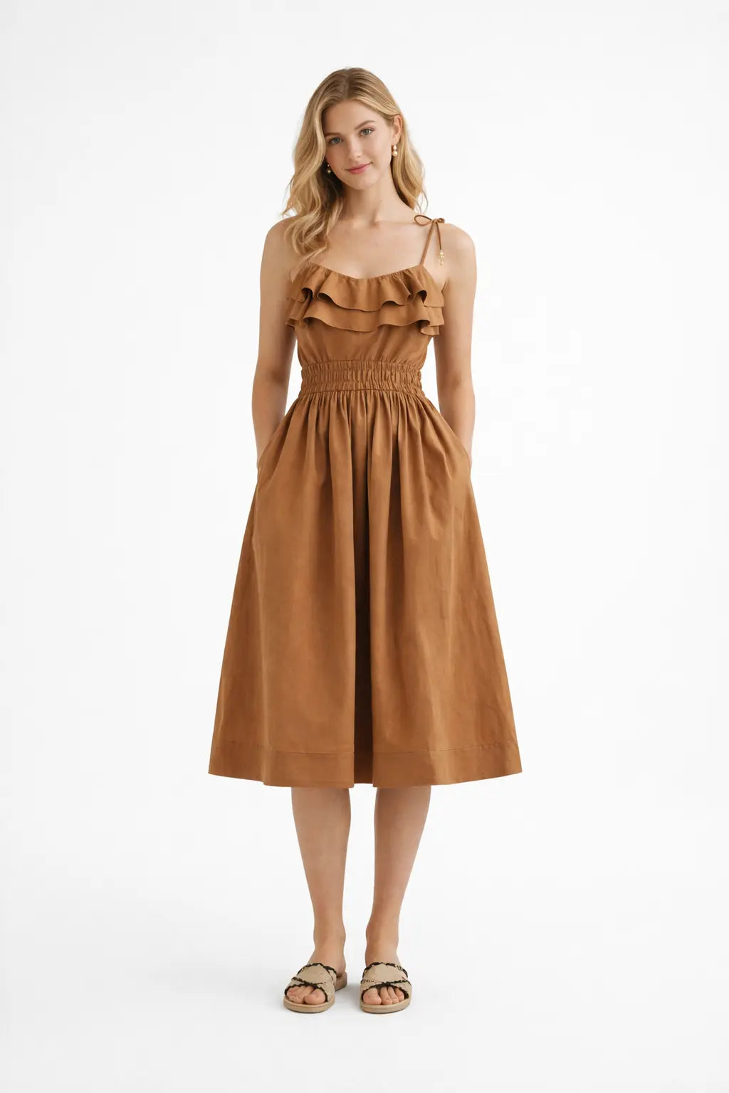 Woman wearing a brown dress on a white background